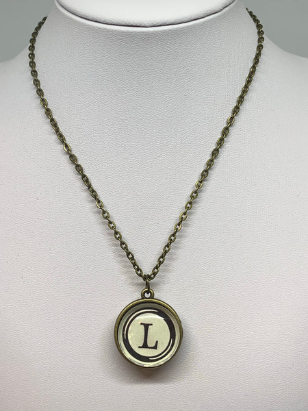 Double Sided Letter Necklace Black Text on White Background